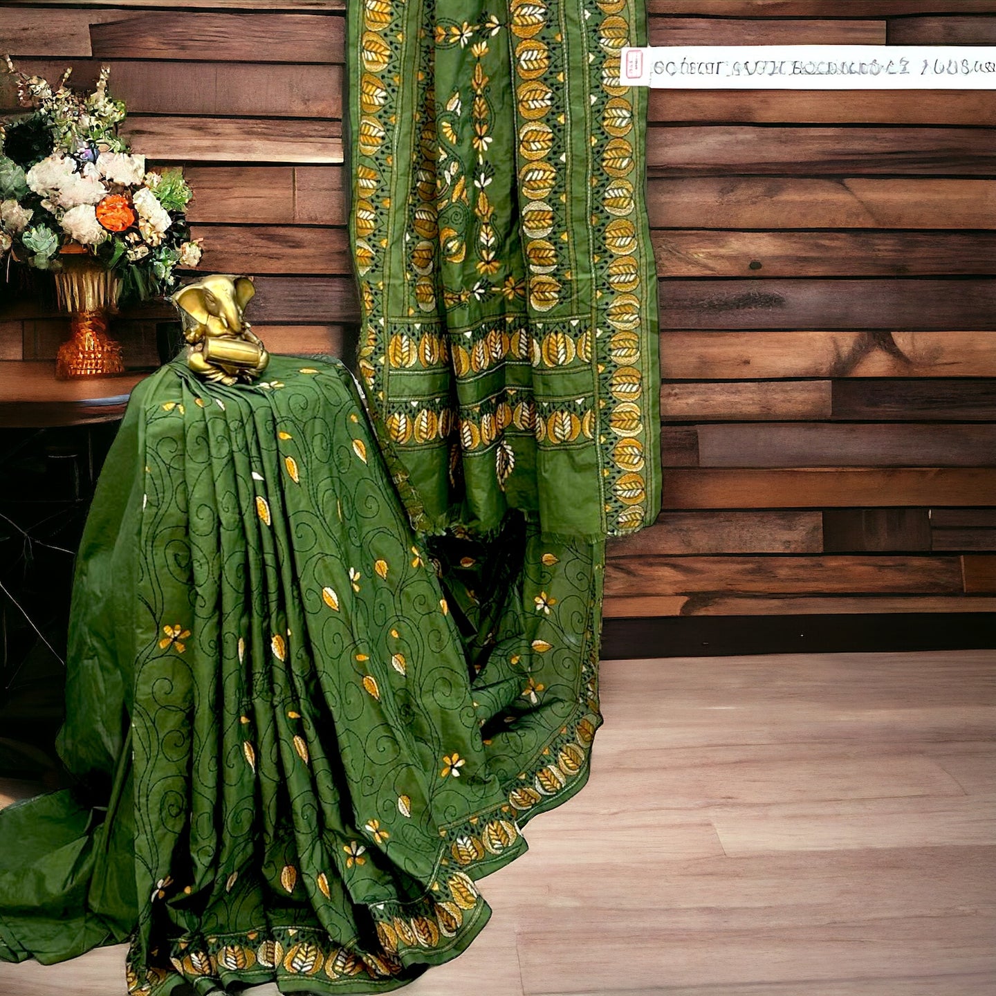 Green silk saree with Katha stitch